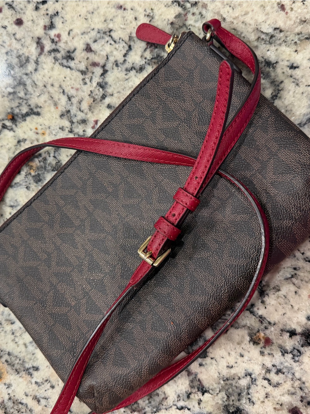 MK Crossbody Bag with Red Strap.